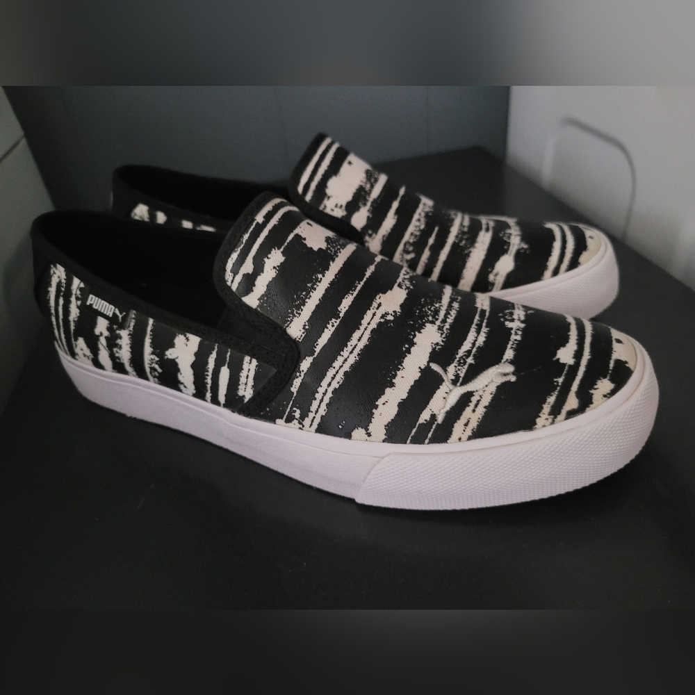 Womens size 10 Zebra print Puma Slide on shoes